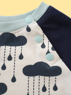 Jelly Bean Sweatshirt, pdf sewing pattern, Frocks and Frolics, raglan sleeve KamSnap closure close up